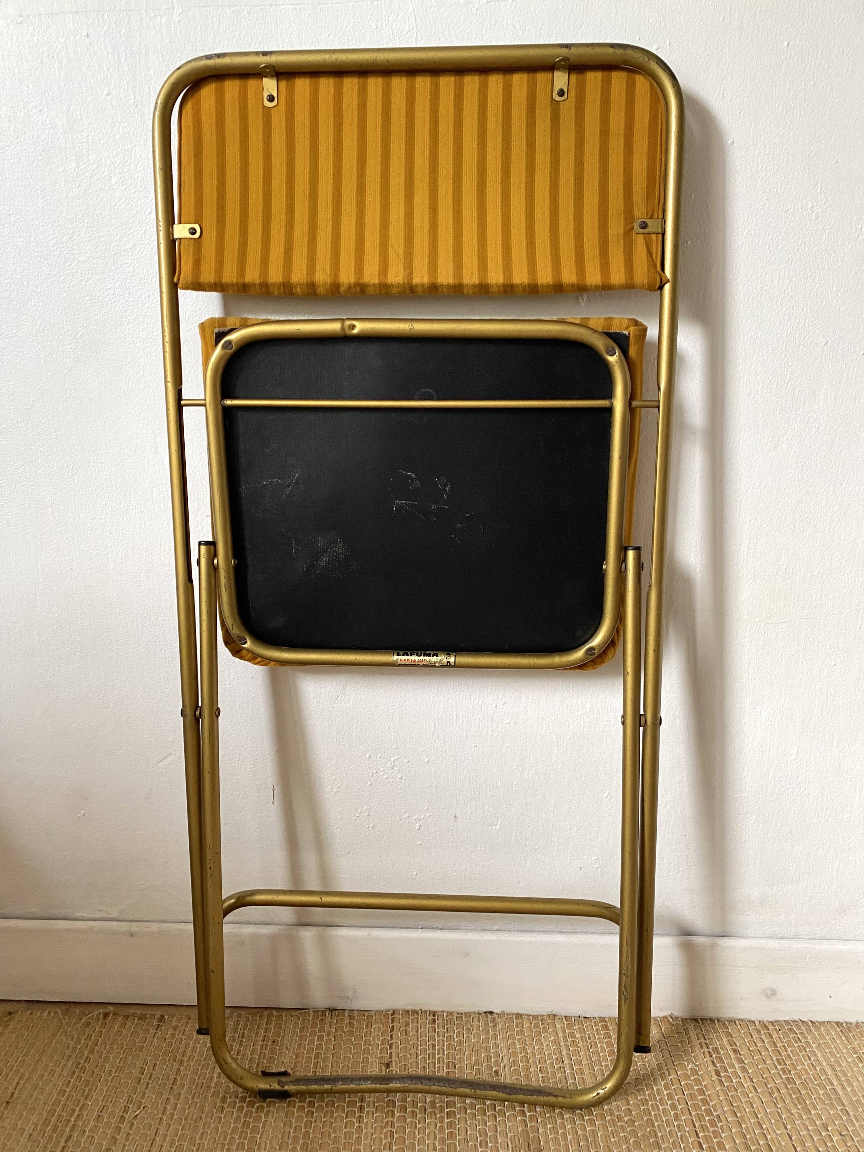 Lafuma folding chairs in velvet and gold metal