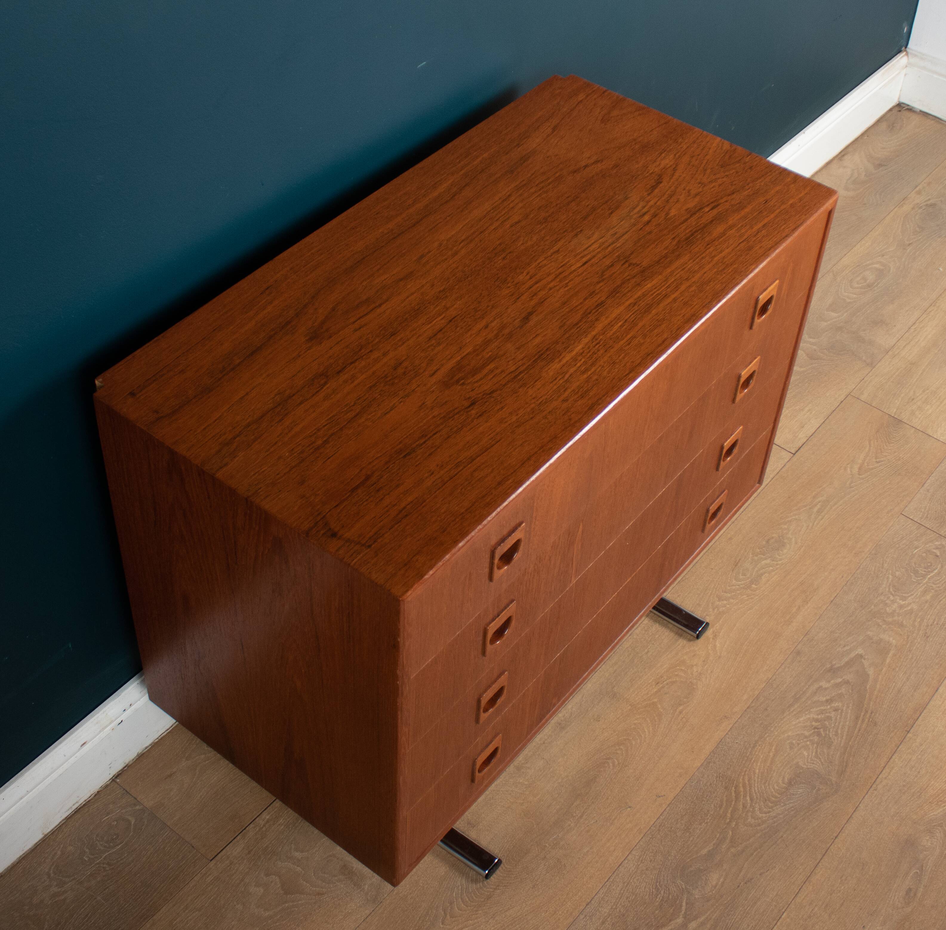 Retro teak 1960s danish chest of drawers on metal legs