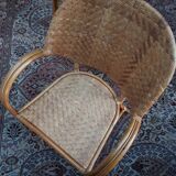 Pair of armchairs in braided rattan 70s