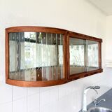 Art Deco-style wall-mounted display cabinet with floral engraving