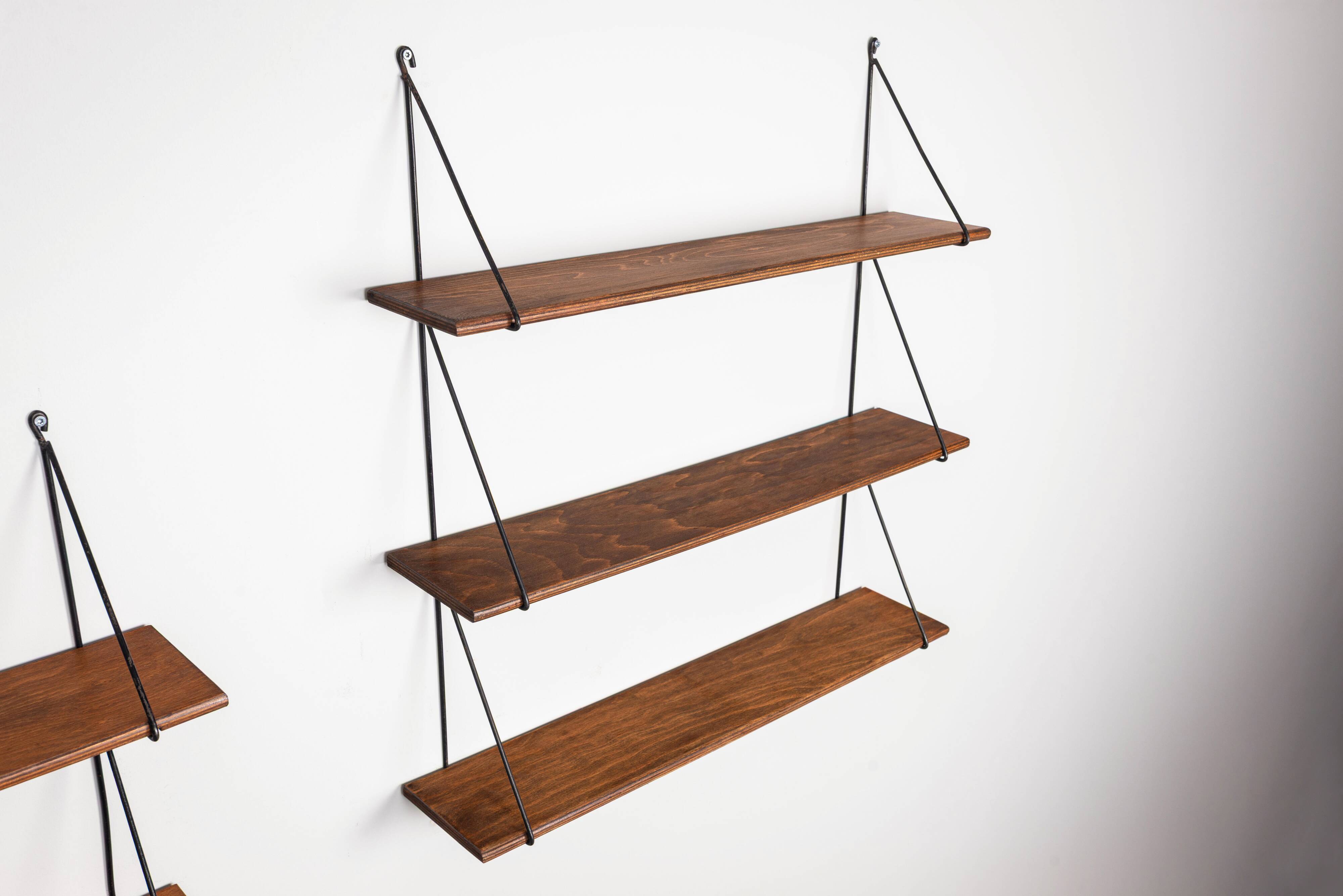 Set of minimalistic wooden shelving units