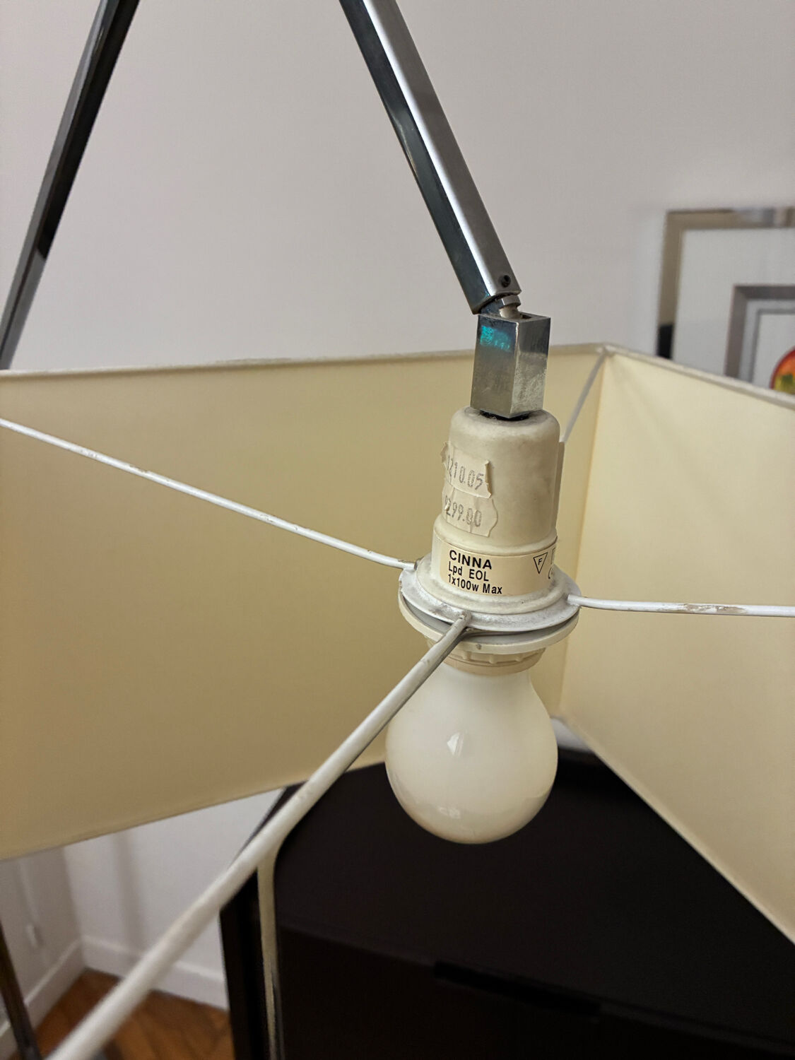 Cinna floor lamp in wood, chrome, and fabric.