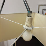 Cinna floor lamp in wood, chrome, and fabric.