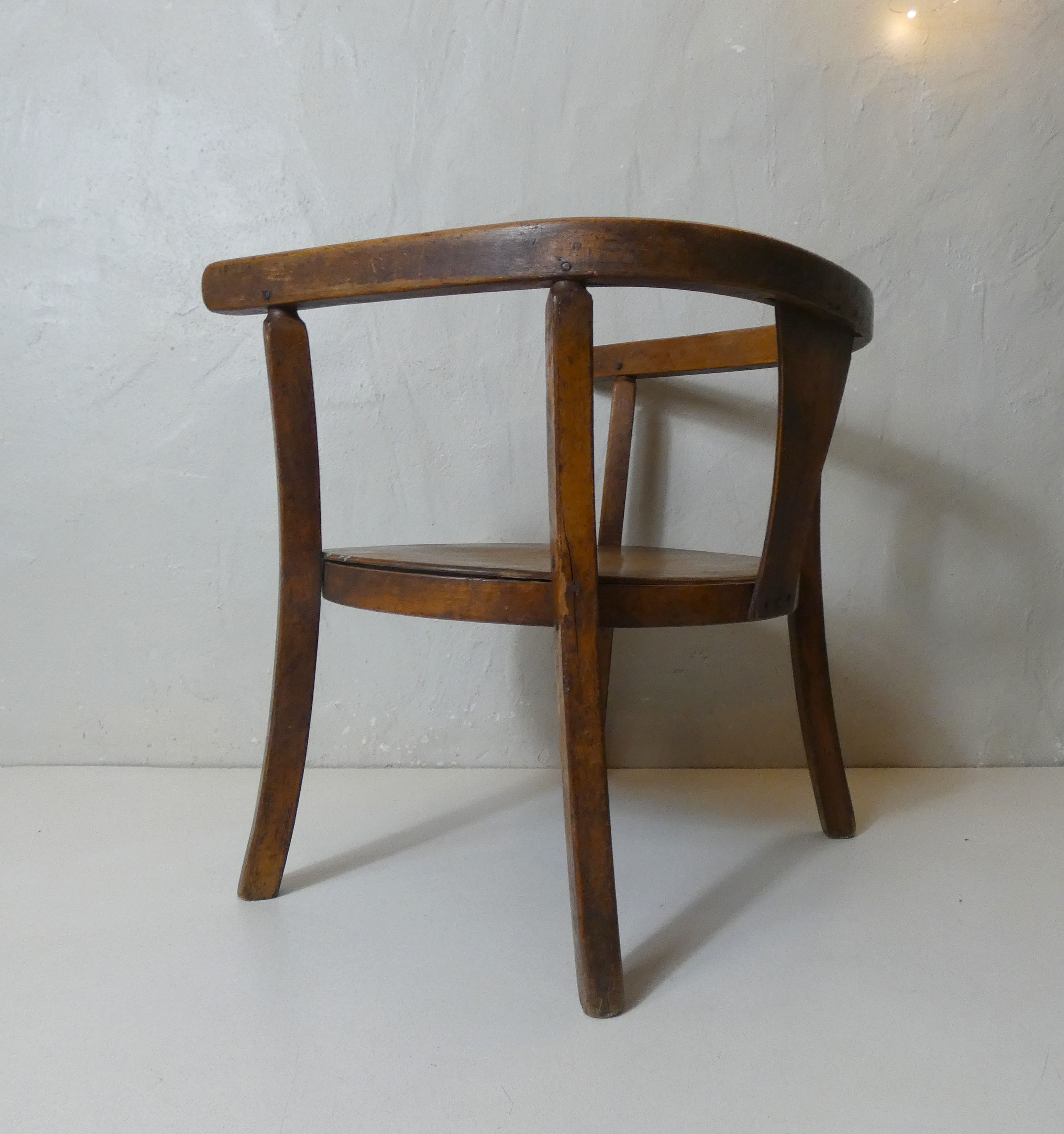 Old wooden armchair for children