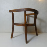 Old wooden armchair for children