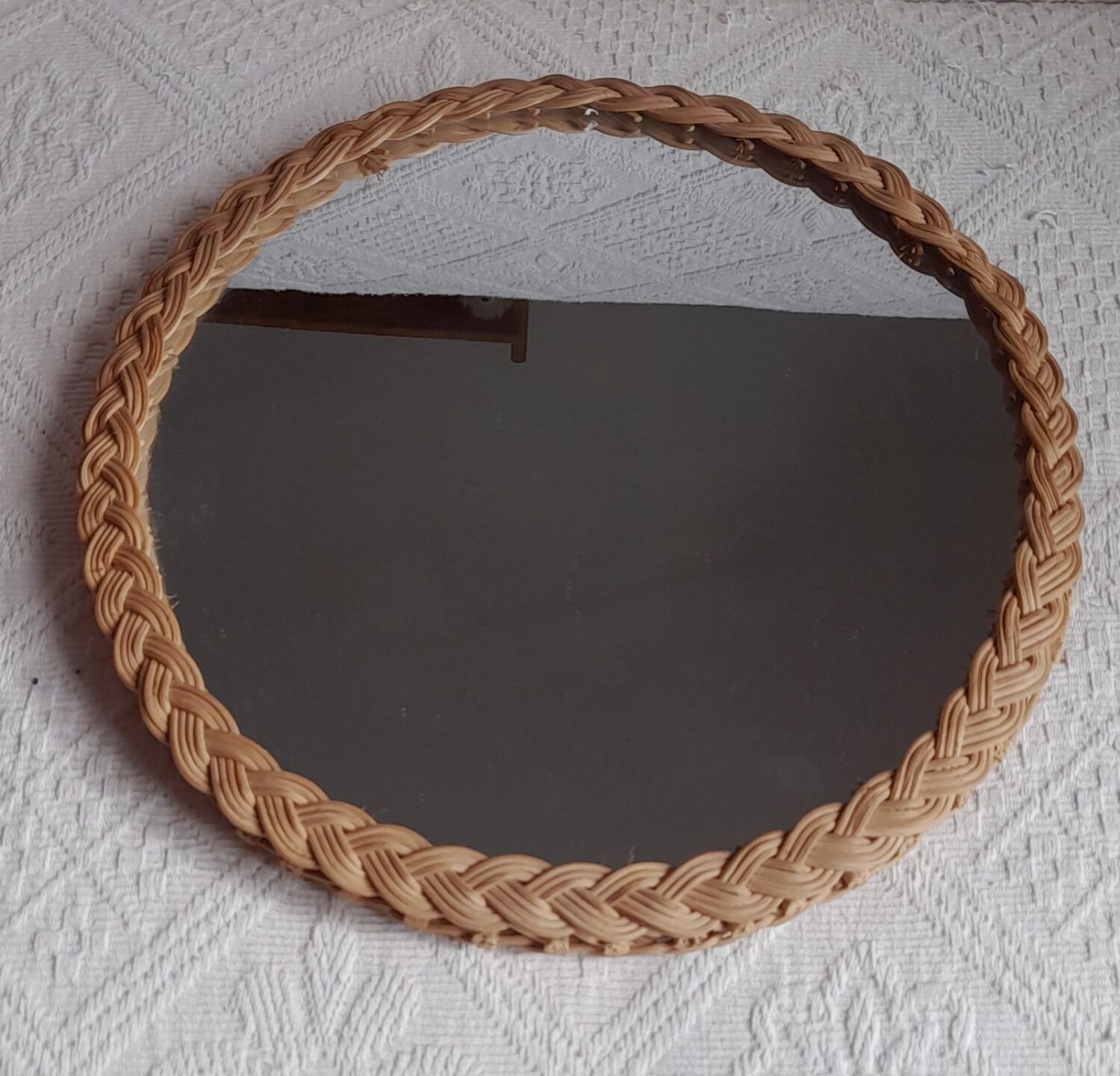 Old vintage braided rattan mirror