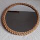 Old vintage braided rattan mirror