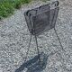 Perforated metal magazine rack from the 1960s.