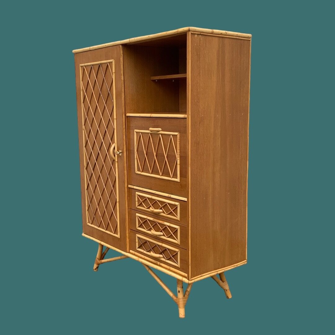 Rattan wardrobe with tapered legs from the 1960s.