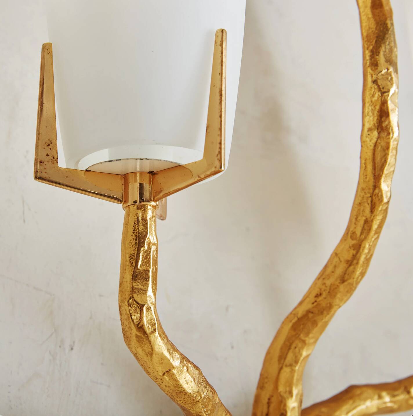 Pair of wall lights by Maison Arlus by Felix Agostini in bronze.