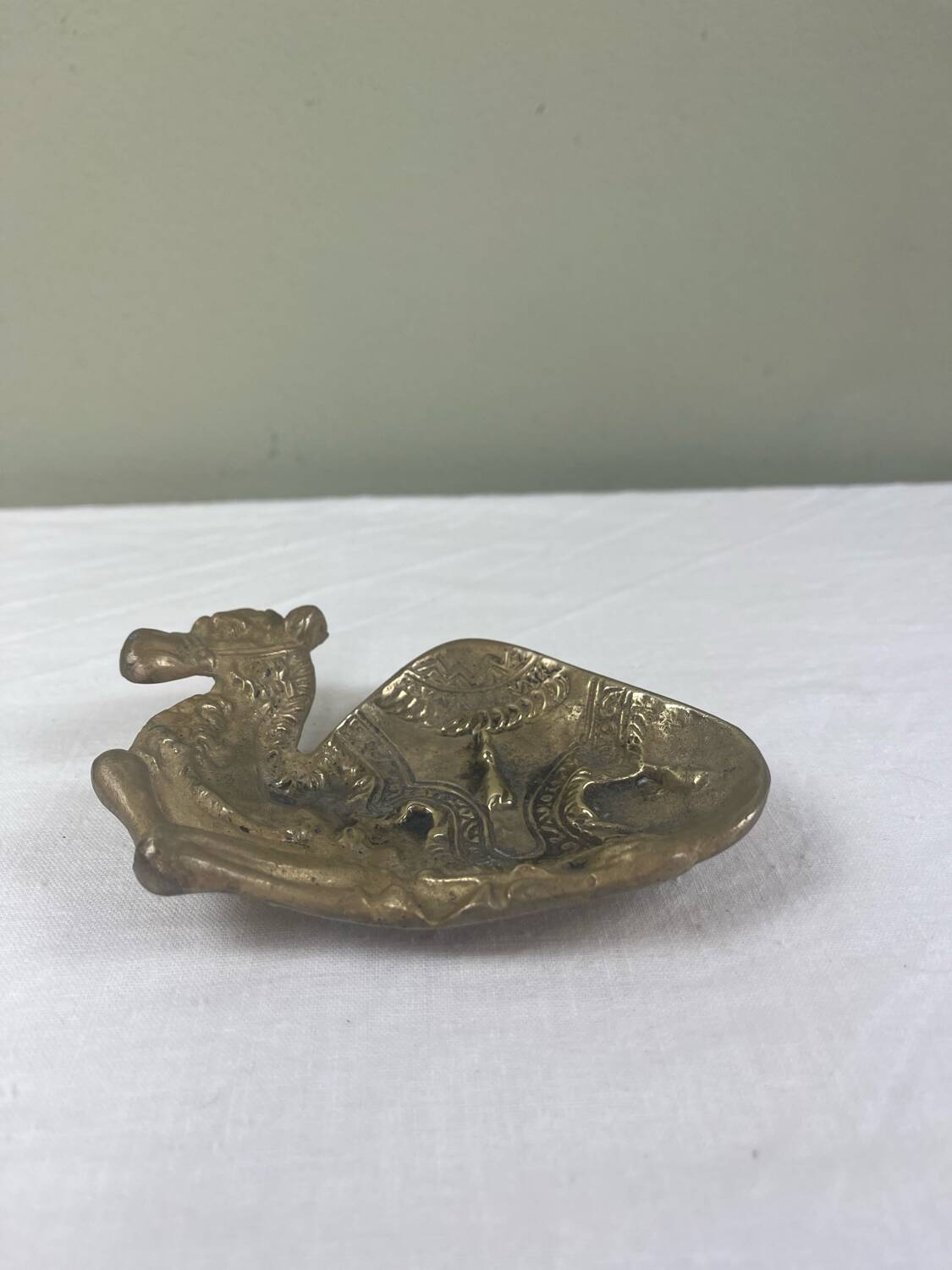 Brass pocket emptier