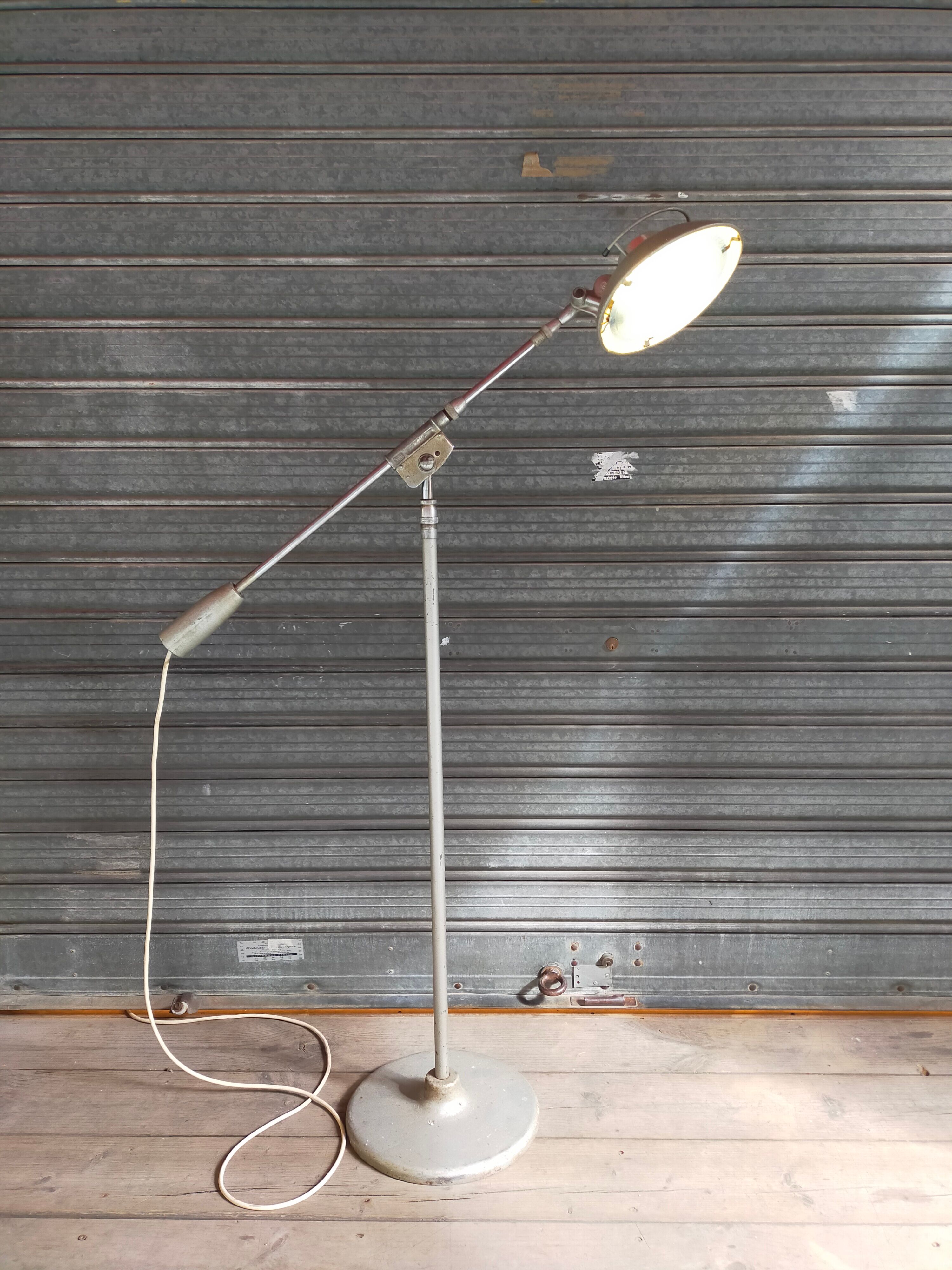 Pendulum floor lamp, model 219s, from the 50s by Ferdinand Solere