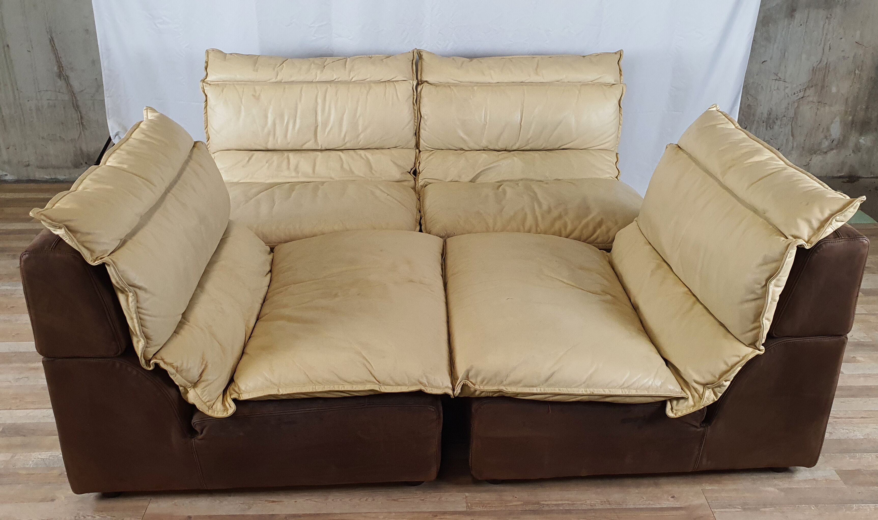 Modular sofa in leather and suede