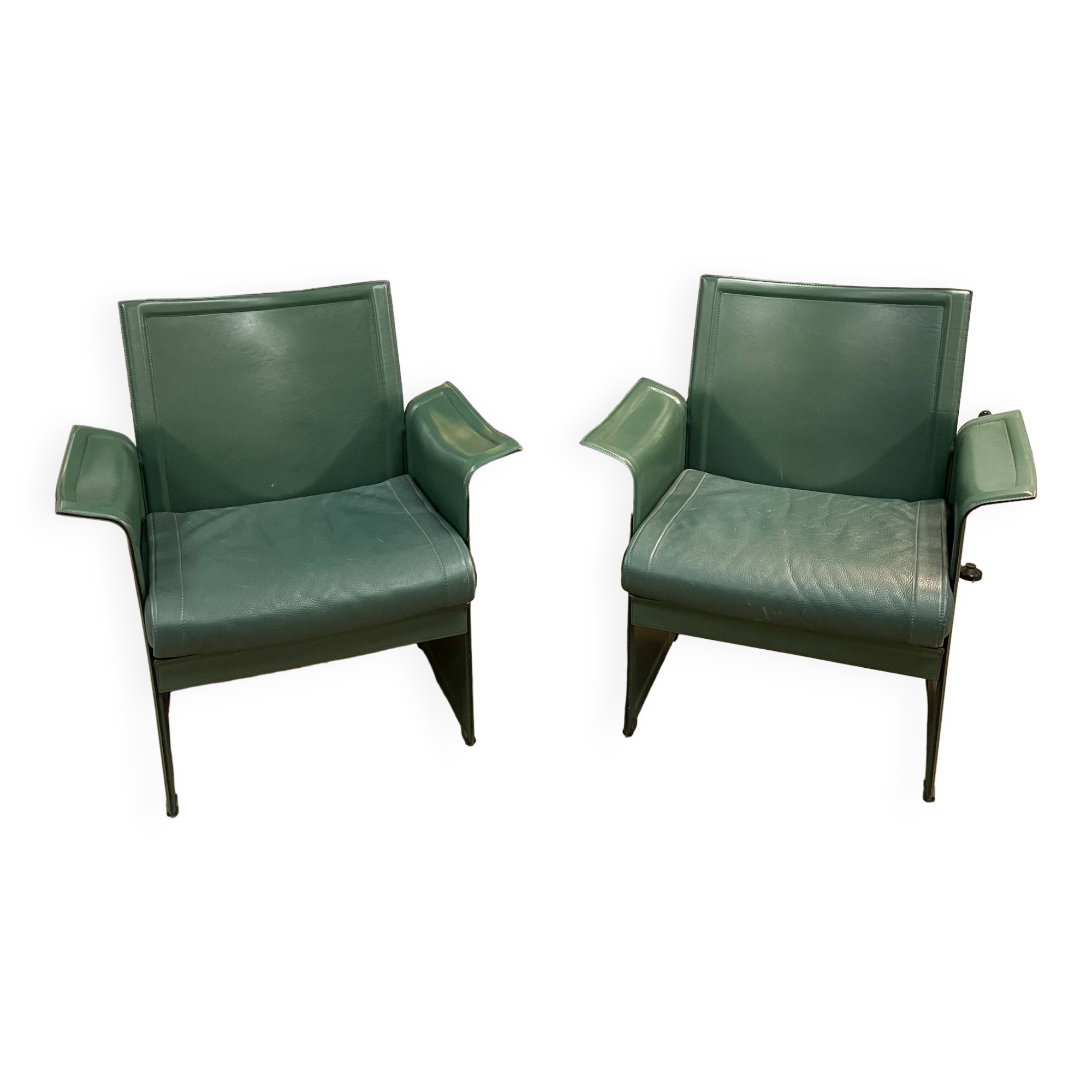Pair of green leather armchairs from the 70s