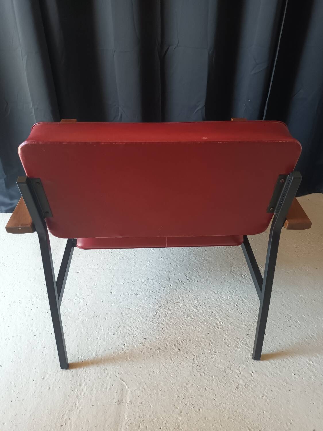 Vintage armchair in burgundy leatherette, wood and black metal