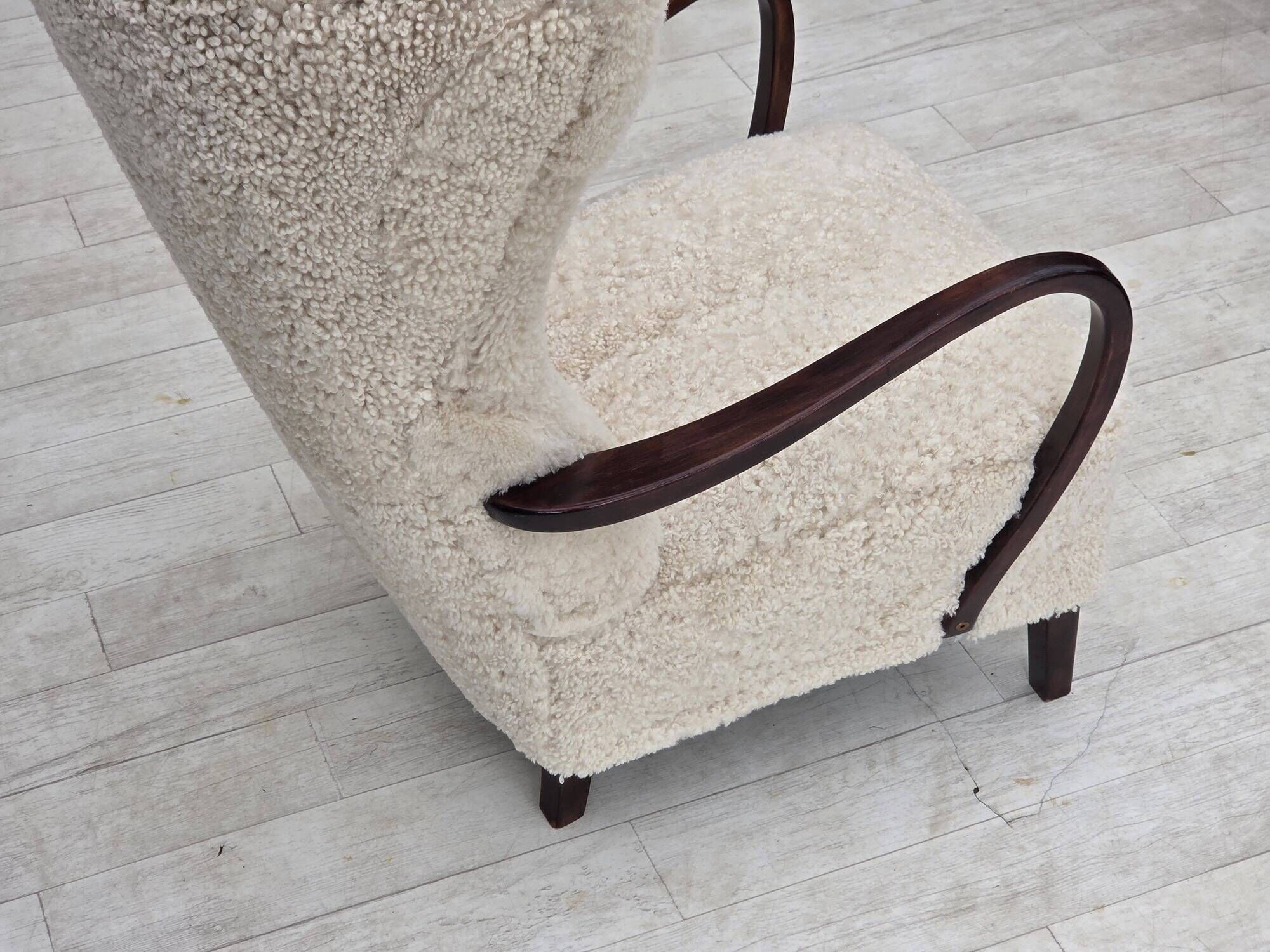 1960s, Danish high-back armchair, genuine sheepskin, reupholstered.