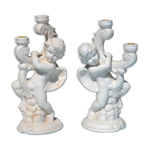 Pair of "cherub" candle holders in plaster