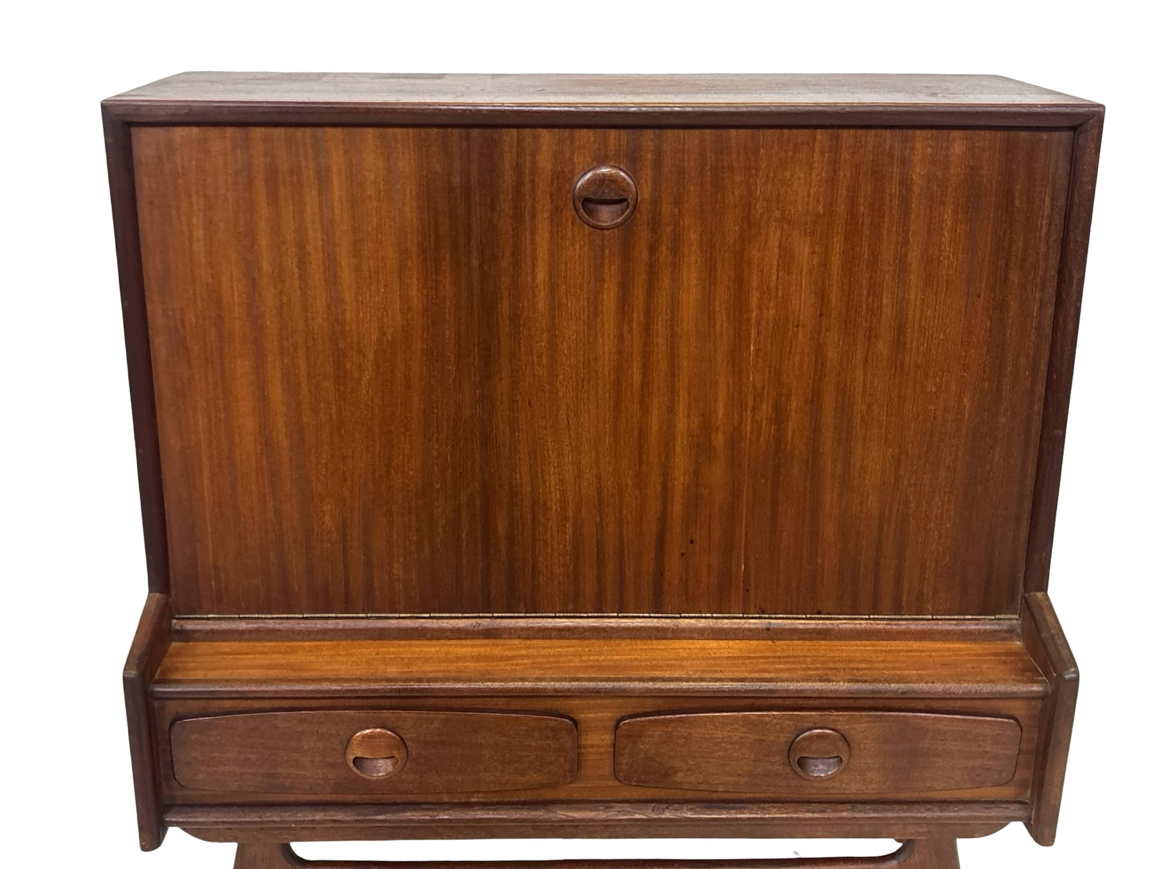 Vintage teak wall cabinet with flap door 1960s design wall unit