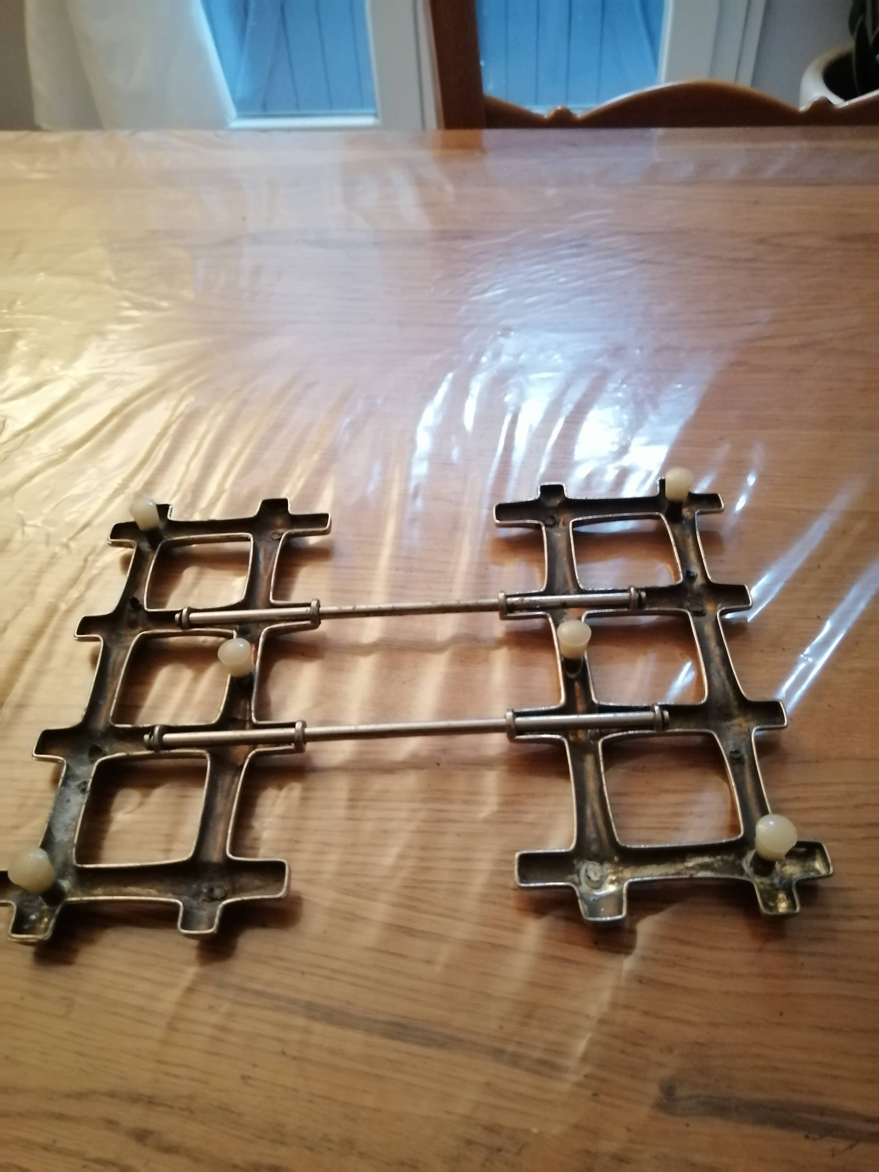 Extendable silver metal trivit year 1970