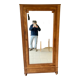 Hosiy or standing man with mirror