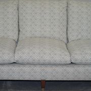 Howard & Sons canapé with feather cushions and ticking fabric, Victorian style.