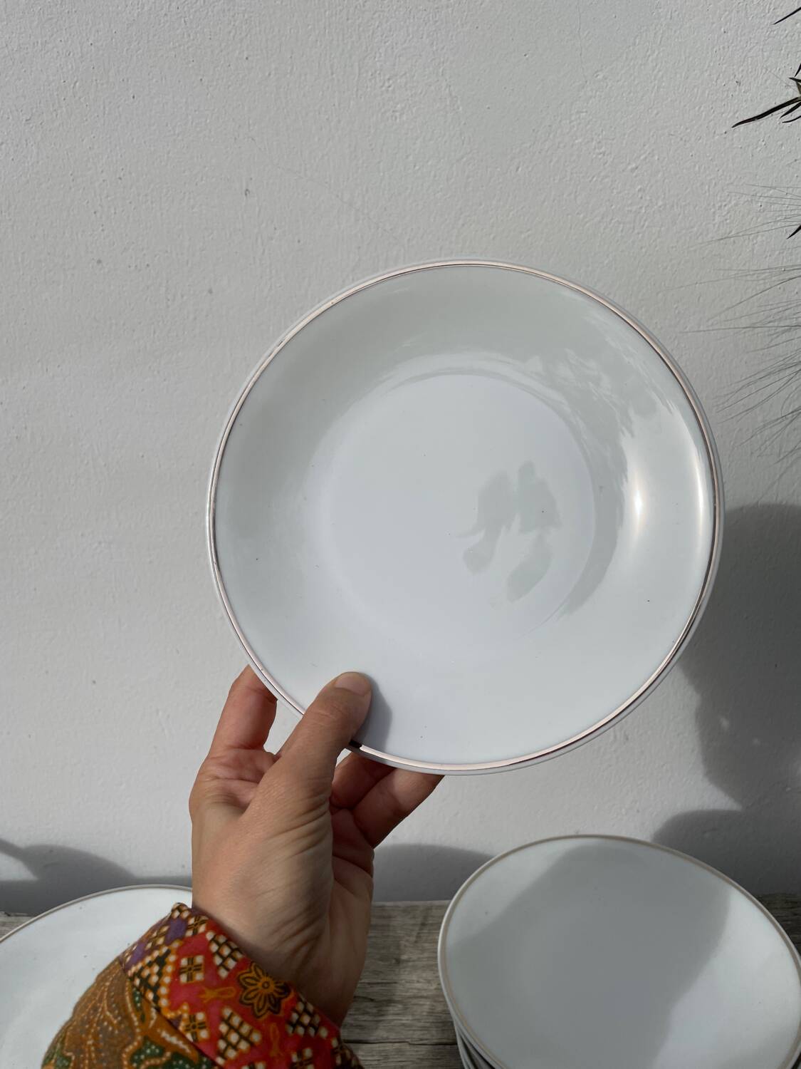 10 assiettes à dessert en porcelaine de Limoges blanches