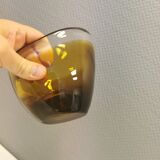 Glass vase in multiple layers of glass, in translucent, amber, yellow colours and shades.