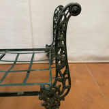 Cast iron bed with floral decorations