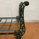Cast iron bed with floral decorations