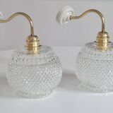 Pair of chiseled glass sconces