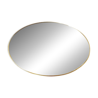 Miroir rond cerclé de laiton