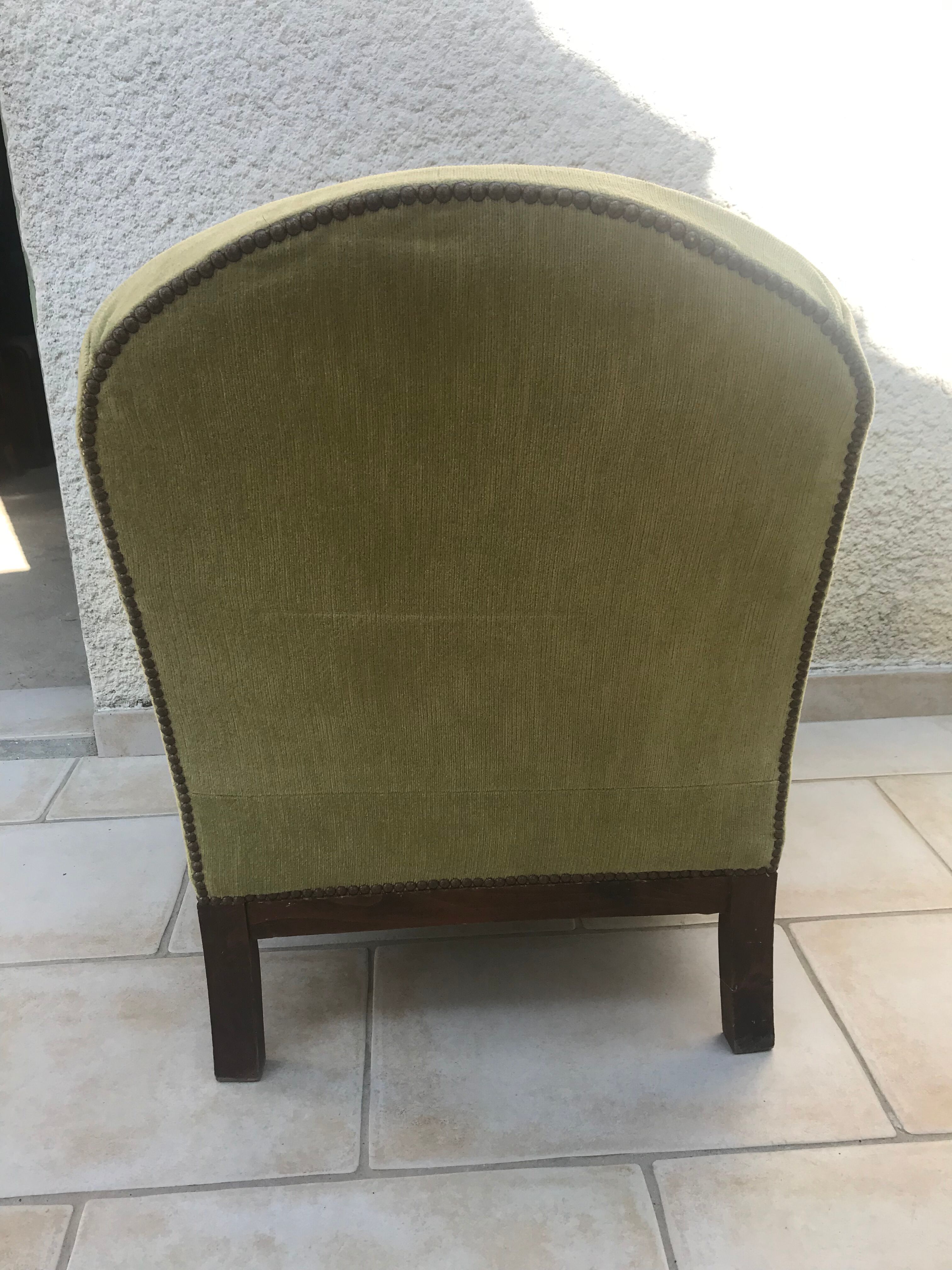 Fauteuil club en velours vert