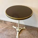 Bistro table in gray cast iron and brown melamine