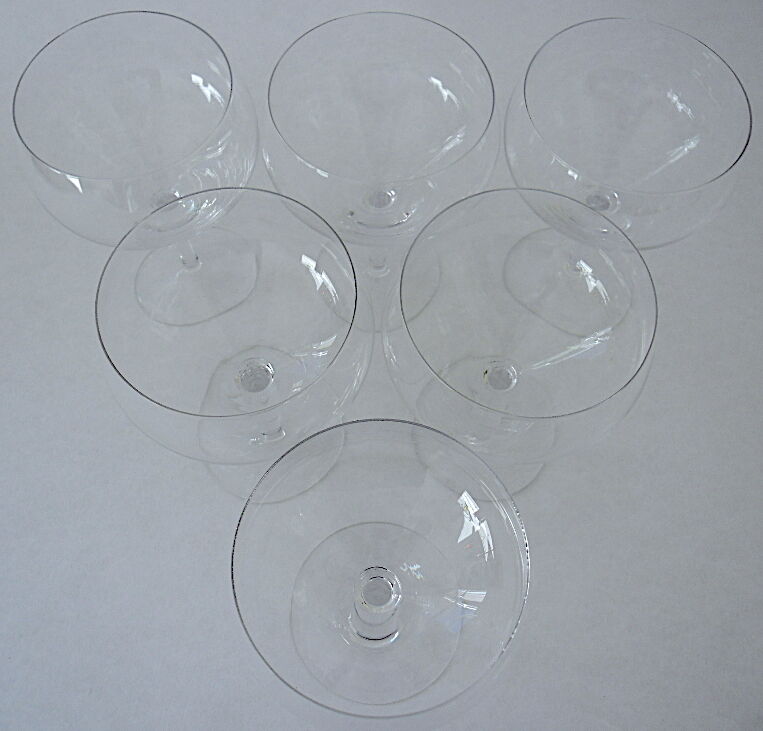 Suite of six beer glasses on foot in colorless crystal