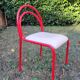 Stackable chairs, Italy, 1980s, red metal, white vinyl