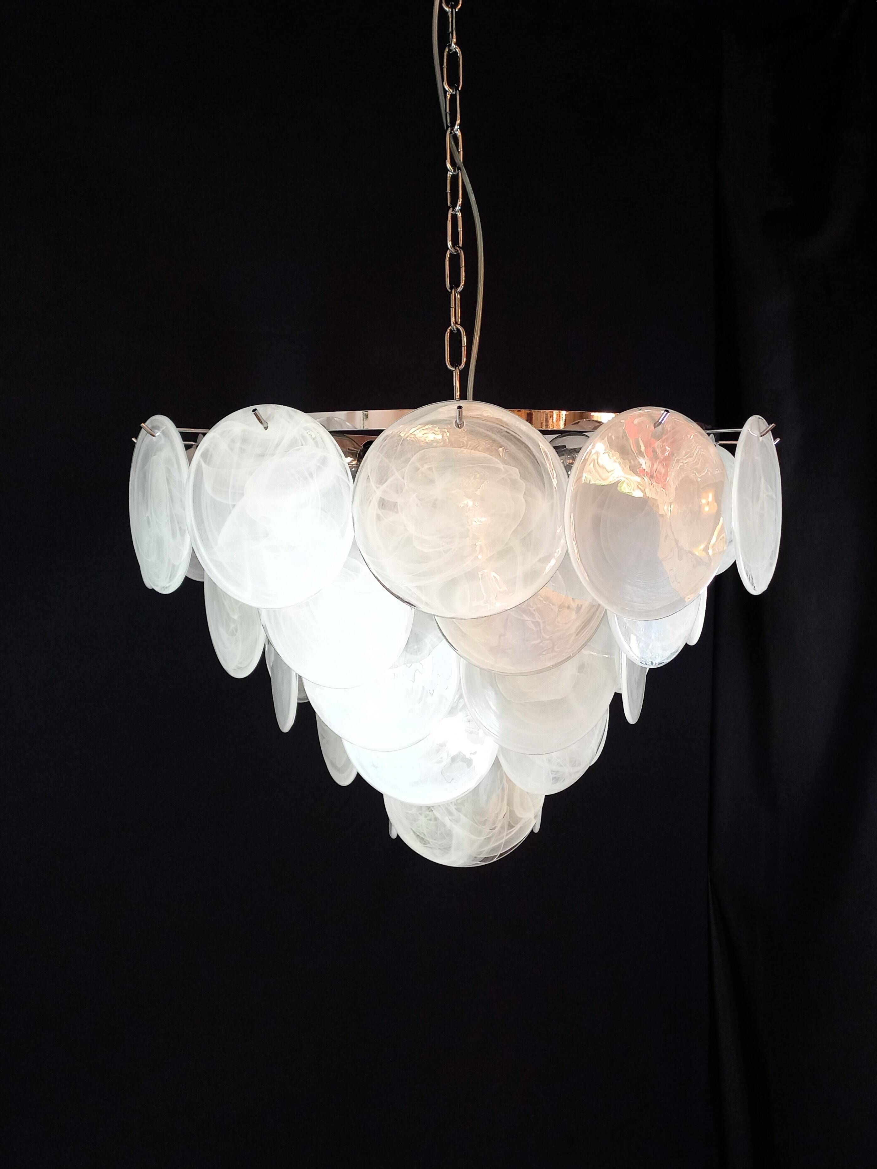 Handcrafted chandelier with Murano glass and handmade alabaster discs.