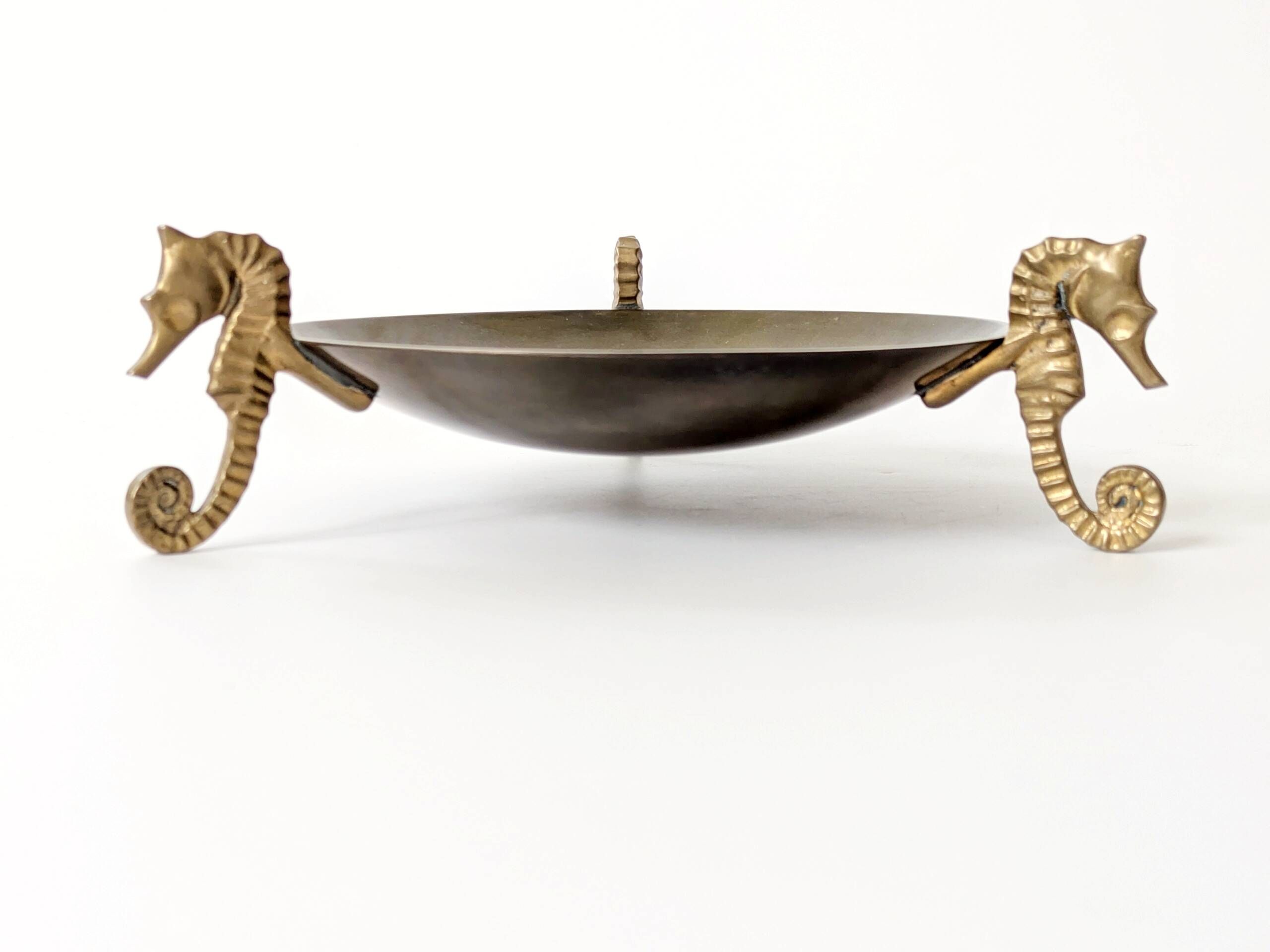 Vintage round brass tray on seahorse feet