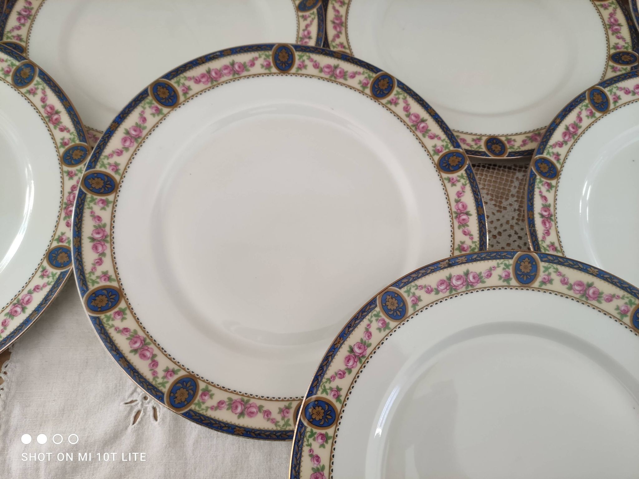 Set of 10 flat plates in Limoges porcelain stamp RN frieze blue old pinks