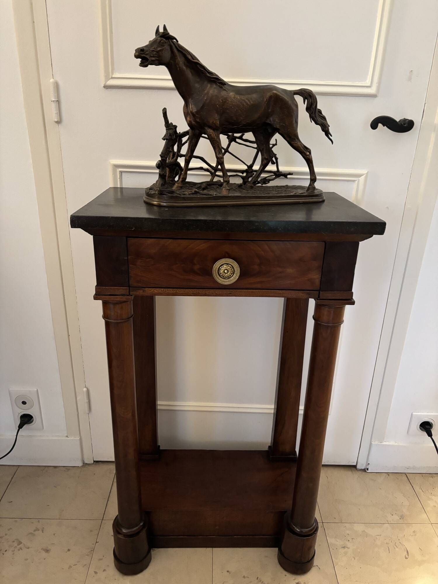 Antique small Empire console from the early 19th century in mahogany and marble.