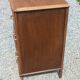 Vintage oak commode with tapered legs from the 1950s.