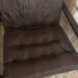 Pair of vintage armchairs in curved wood with suspended seat circa 1970-80.