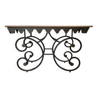 Wrought iron console on foot