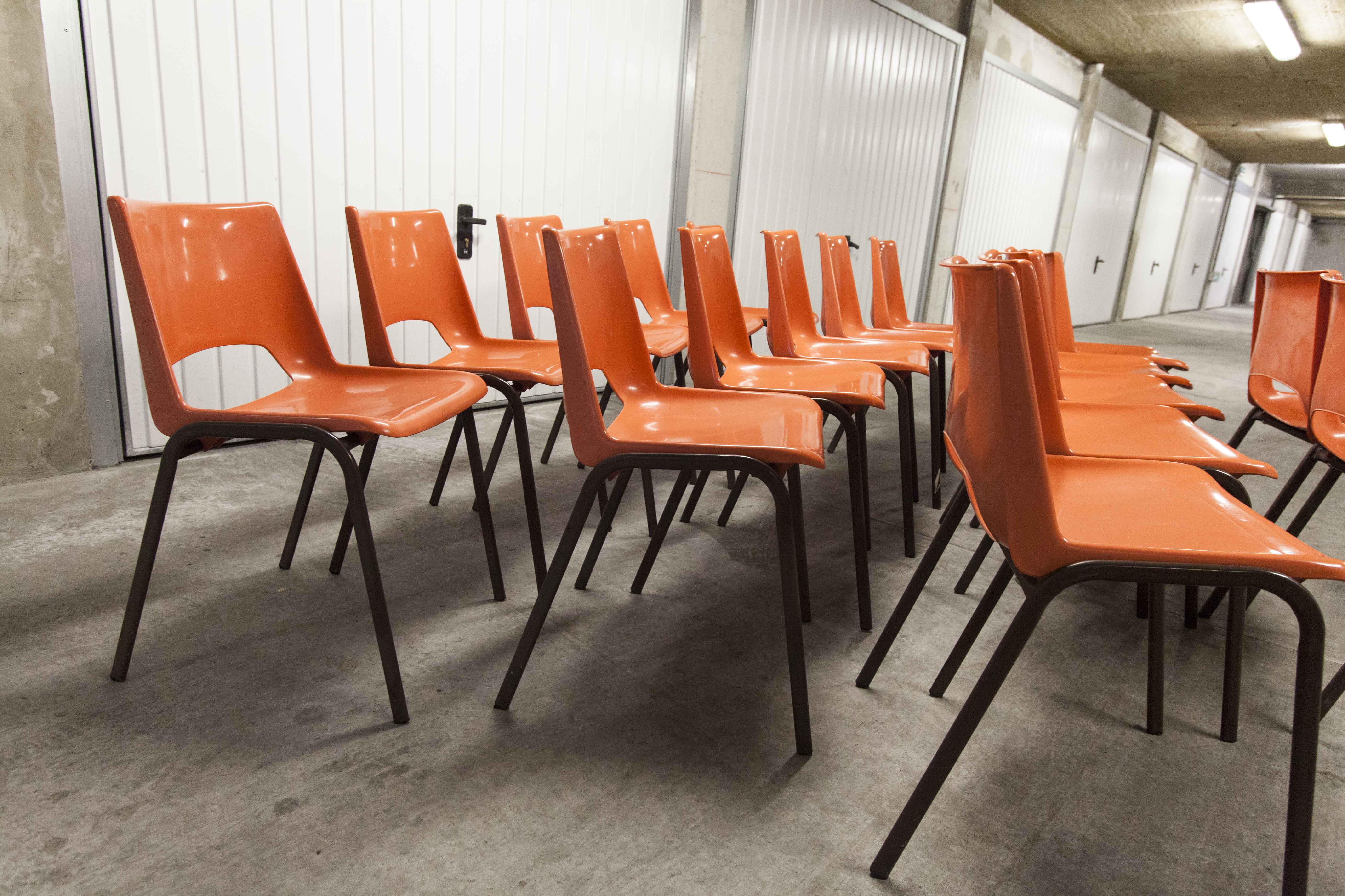 Set of 17 vintage orange chairs 1970