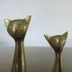 Couple of stylized cats in brass 70s