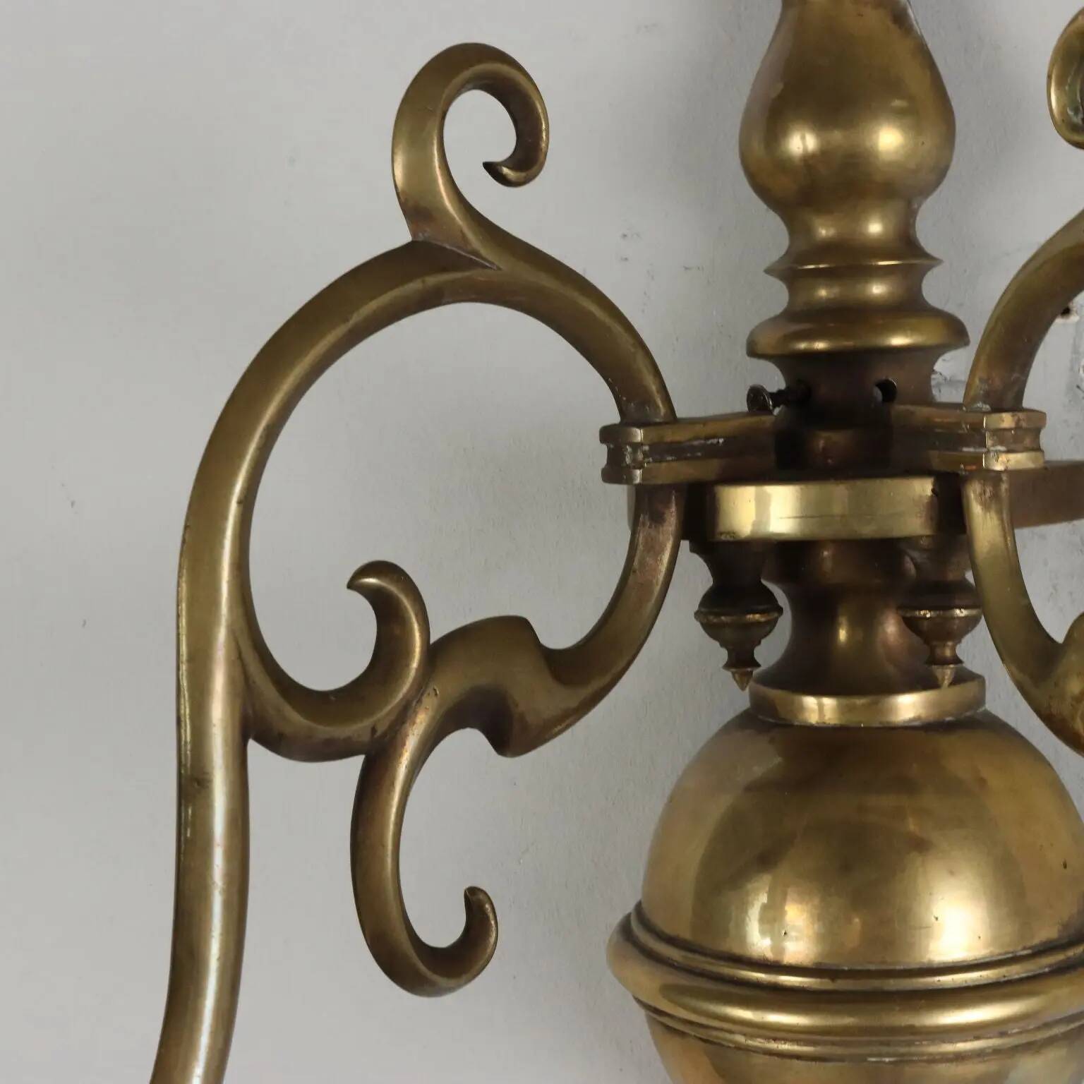 Pair of antique wall sconces in 20th-century Baroque style.
