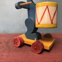 Old wooden wheeled rabbit toy