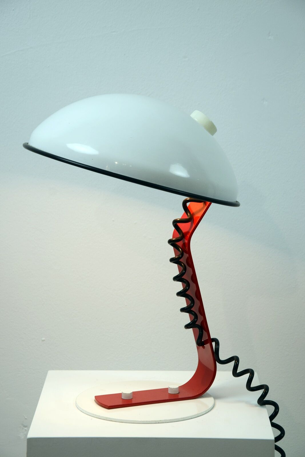 White and red steel desk lamp