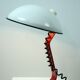 White and red steel desk lamp