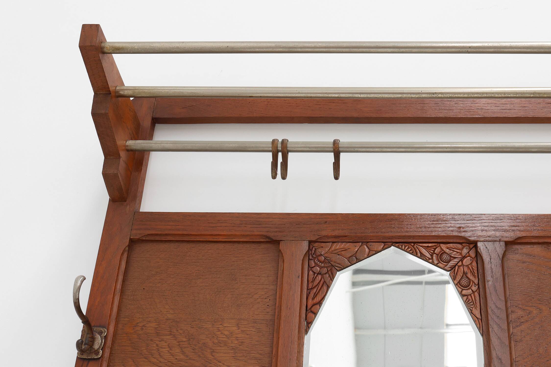 Art Deco oak carved wall coatrack with mirror, France 1920s