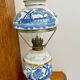 Lampe à pétrole en porcelaine de delphe